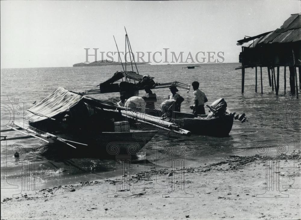 Press Photo Native boats and houses in Dutch New Guinea - Historic Images
