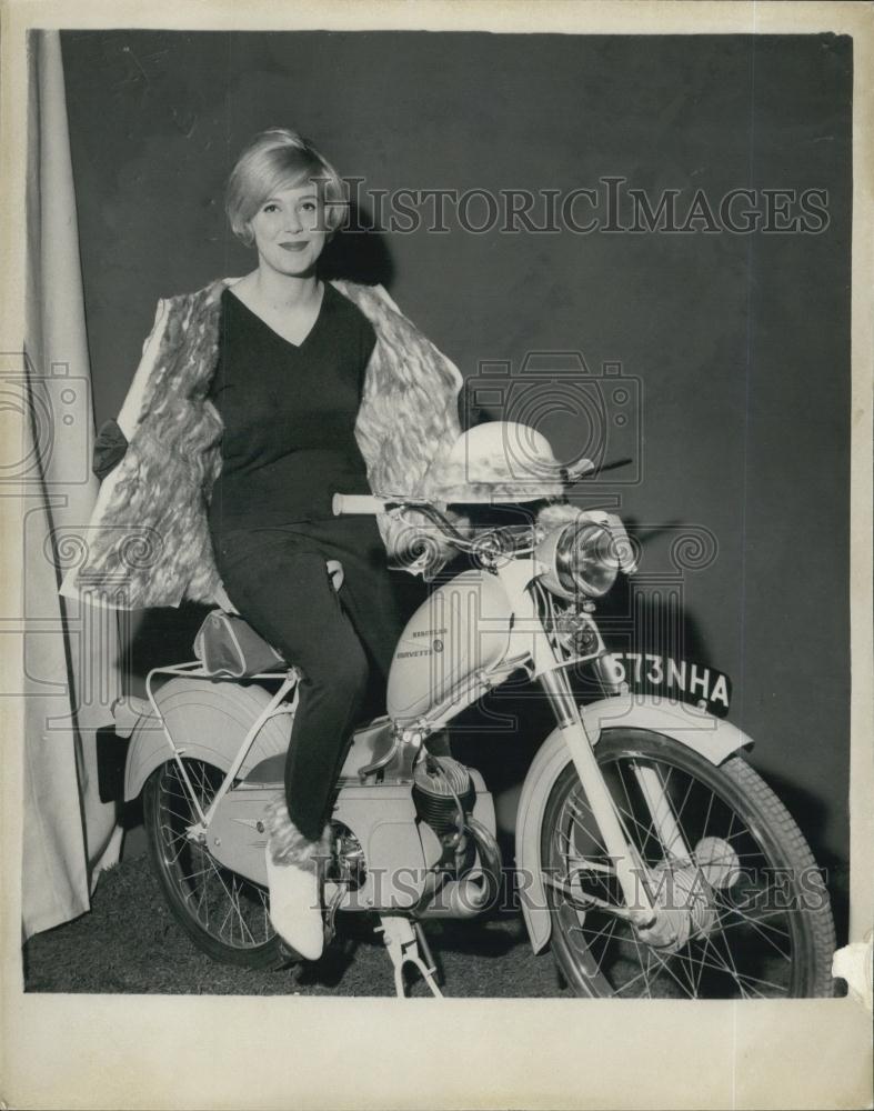 Press Photo Fashion model on a motorcycle - Historic Images