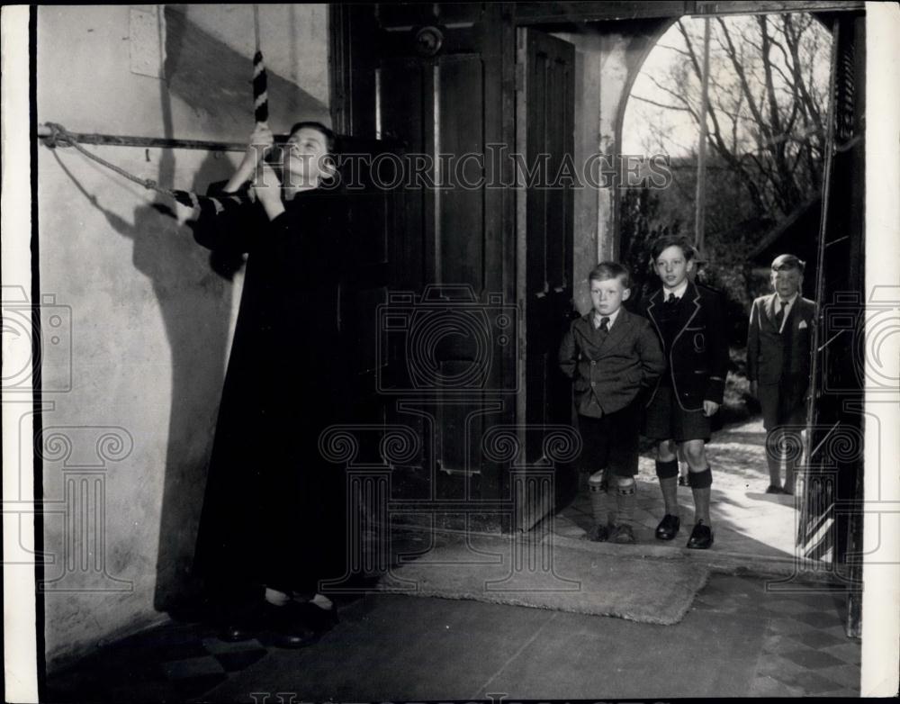 Press Photo Boy Ringing Bell St. Paul&#39;s Church For Children&#39;s Service - Historic Images