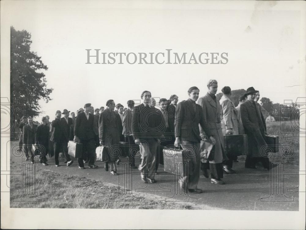 Press Photo German Men March With Their Briefs Along The Road - Historic Images