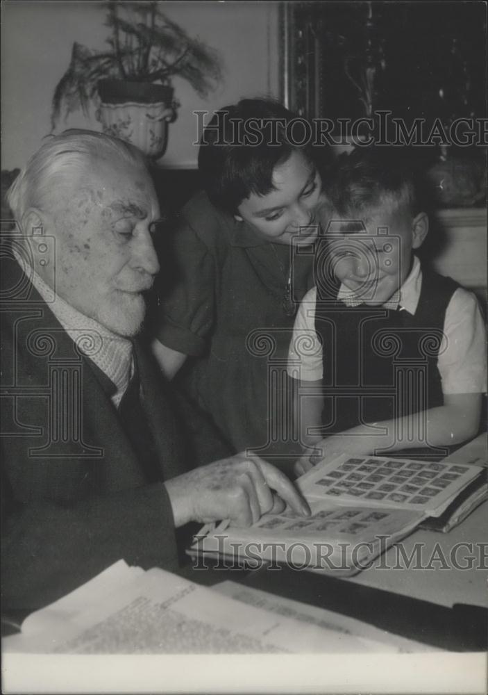 1956 Press Photo Louis Noir with his Stamp Collection and Grandchildren - Historic Images