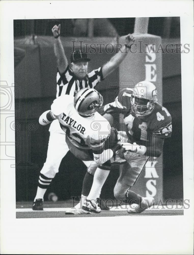 1991 Press Photo Seattle Seahawks Eugene Robinson & 49er's Player John Taylor - Historic Images