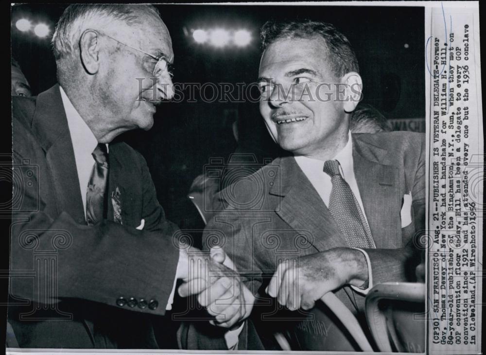 1956 Press Photo Gov Thomas E Dewey gives Publisher William Hill a handshake - Historic Images