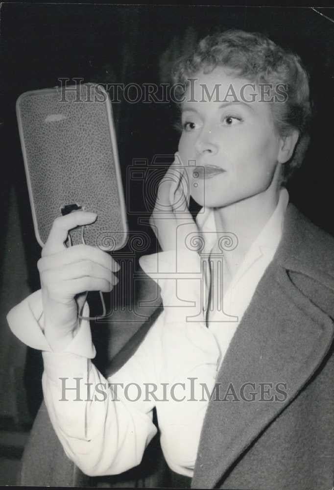 1957 Press Photo Helene Roussel Actress Touches Up Makeup Film "Backlash" - Historic Images