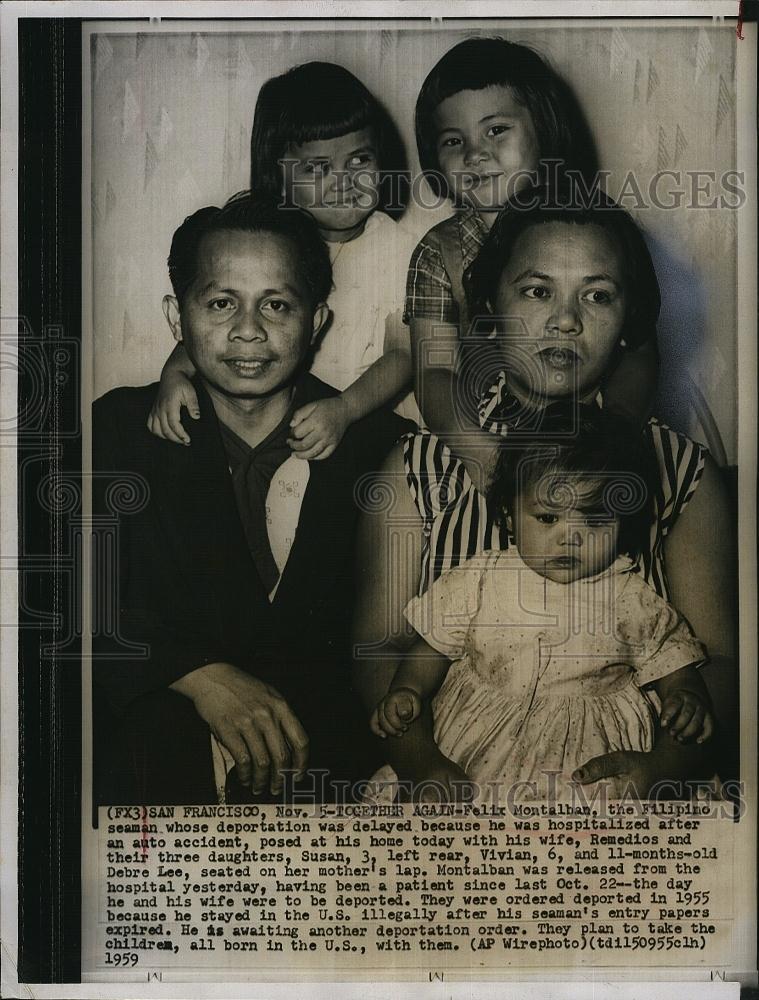 1959 Press Photo Felix Montalhan Fillipino seaman with wife and daughters - Historic Images