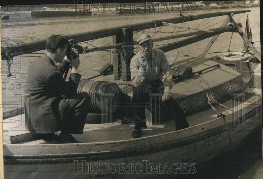 Press Photo Kaj Nielsen Aboard Boat in France - Historic Images