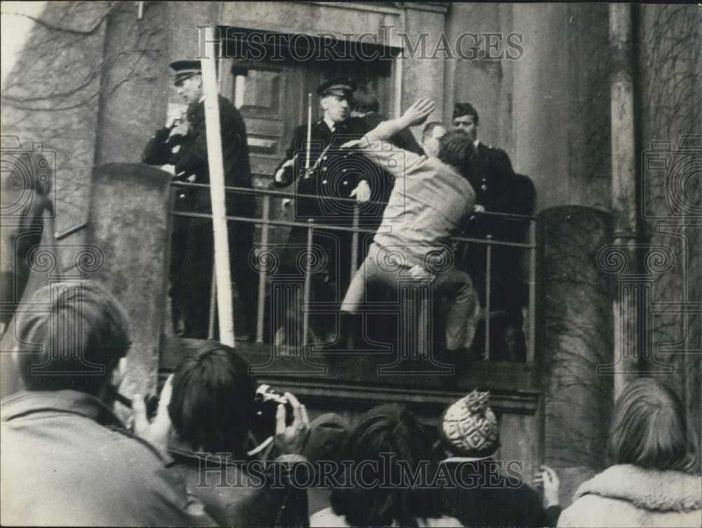 Press Photo Police Push Student off Balcony at University Riots - Historic Images