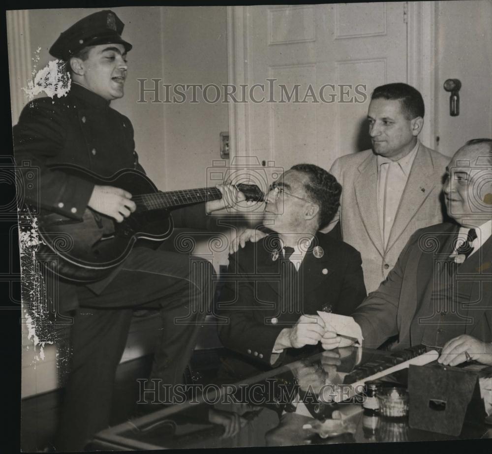 1954 Press Photo East Boston singing patrolman Lou Rossi - RSL89197 - Historic Images