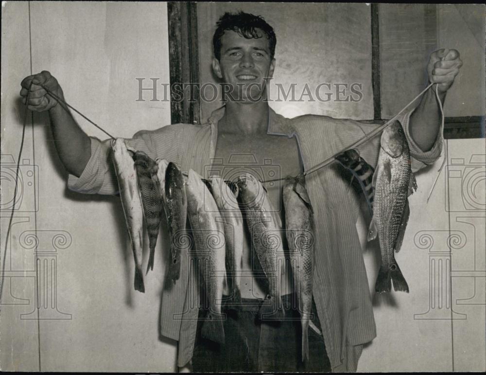 1958 Press Photo Dick Davis and the fish he caught at Gandy Bridge - RSL69607 - Historic Images