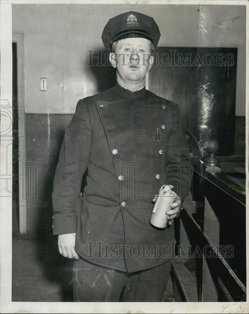 1947 Press Photo Patrol Francis Daly Holding Tear Gas Bomb-Louis Se Rosa Veteran - Historic Images