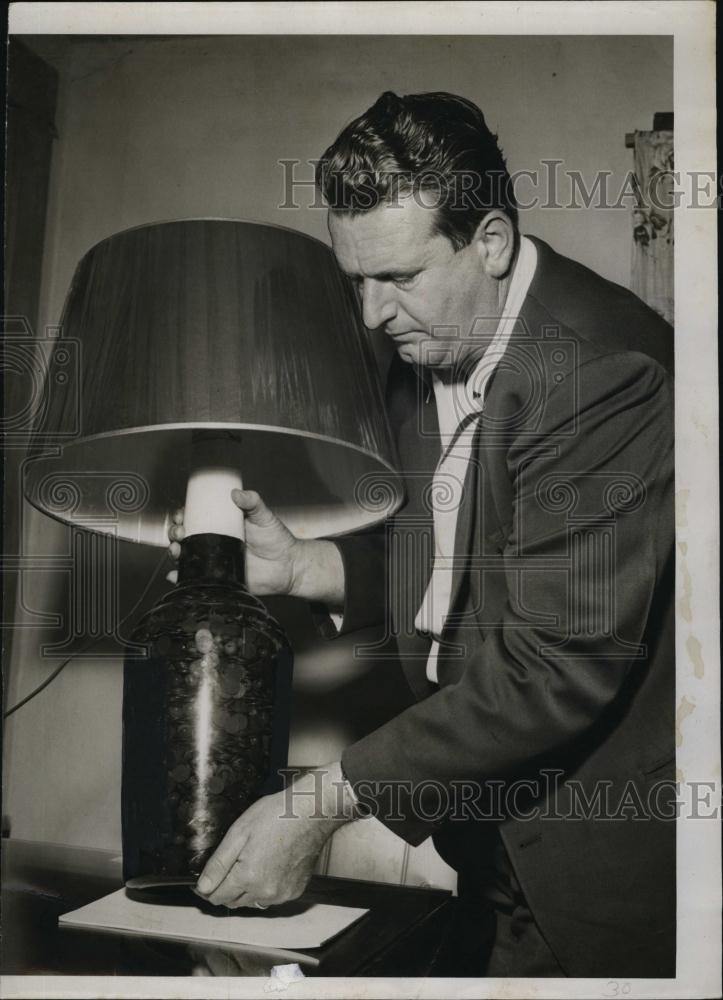 Press Photo Jimmy VIckers with Lamp Full of Pennies - RSL92341 - Historic Images