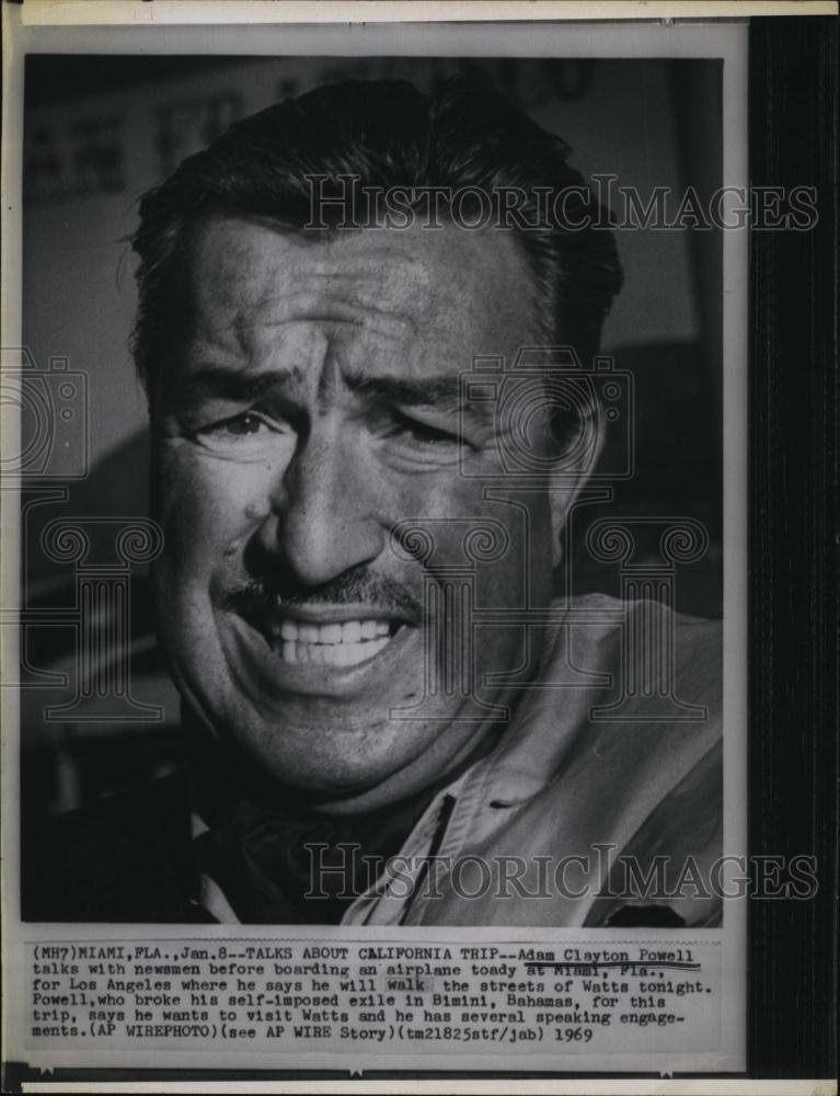 1969 Press Photo RepAdam Clayton Powell, boarding plane to California - Historic Images