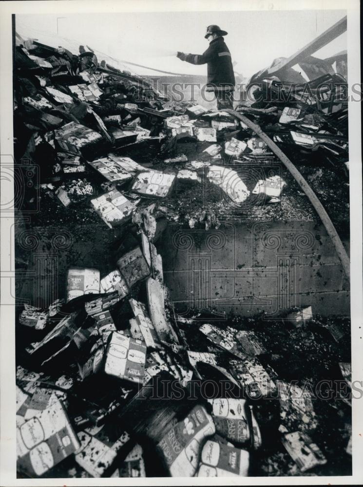 1976 Press Photo Firemen Put Out Fire at Hood&#39;s Dairy Warehouse - RSL64907 - Historic Images