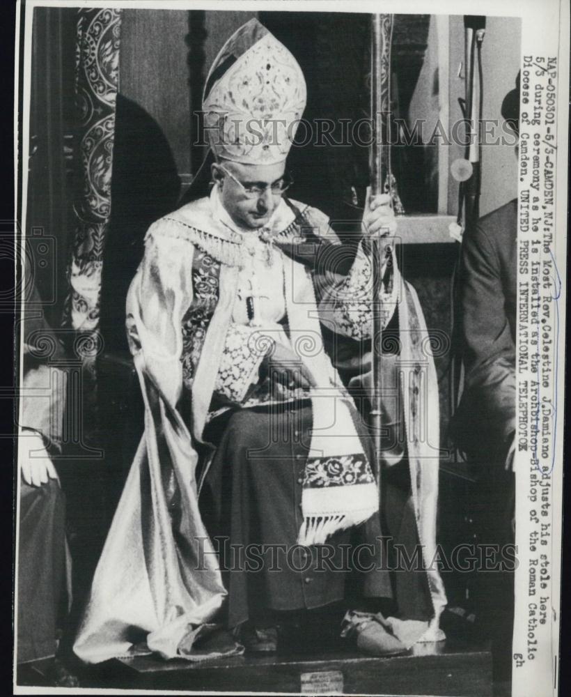 1960 Press Photo Rev Celestine J Damiano Adjusts Stole During Ceremony - Historic Images