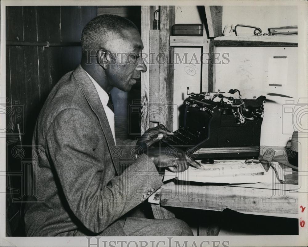 1956 Press Photo Frank Robinson Prepares Data Sheet For Publication - RSL99173 - Historic Images