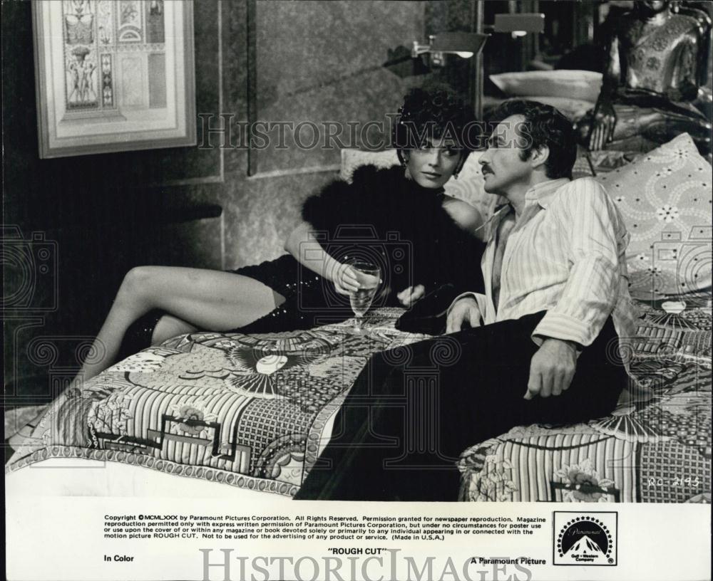 1980 Press Photo Burt Reynolds and Lesley-Anne Down in "Rough Cut" - RSL05033 - Historic Images