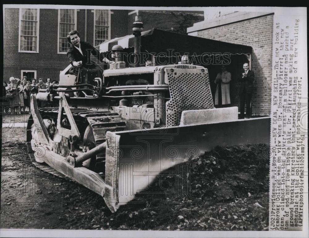 1961 Press Photo Dr Pierrel on a bulldozer at Pembroke College, RI - RSL88385 - Historic Images