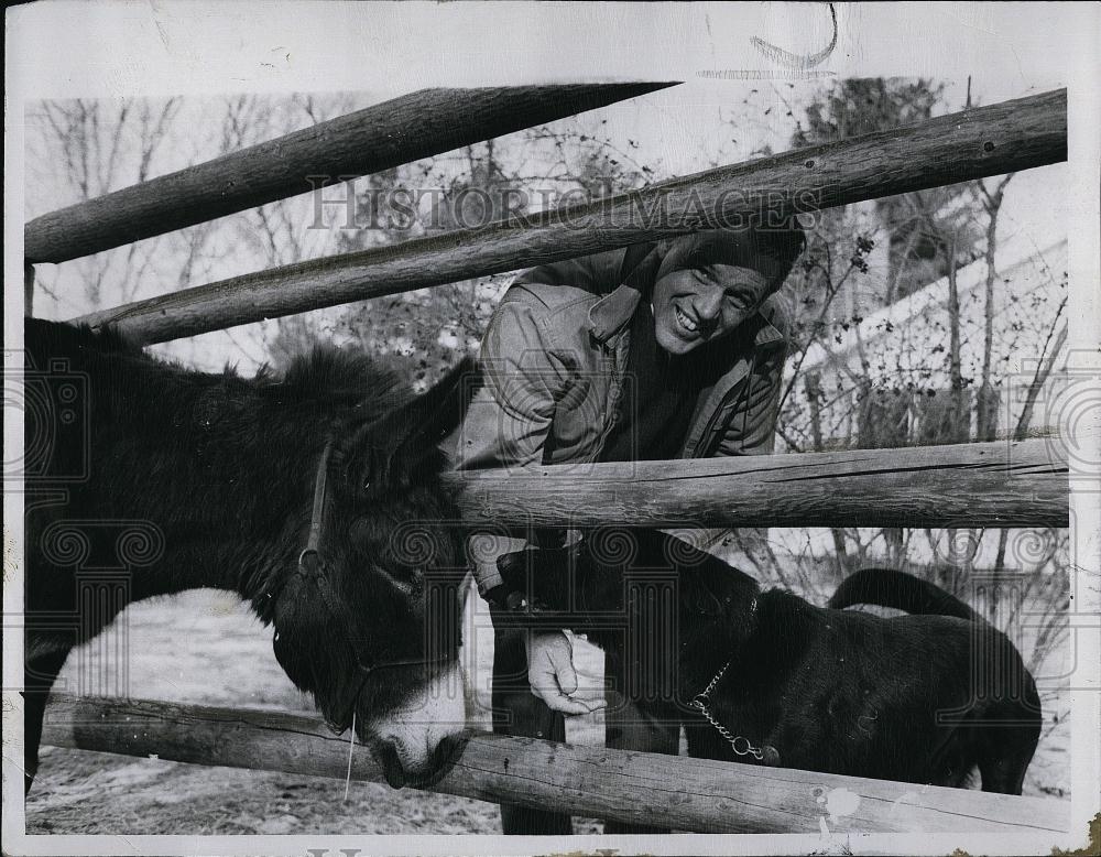 1969 Press Photo Mass Governor and his pet burro 7 dog at home - RSL90367 - Historic Images