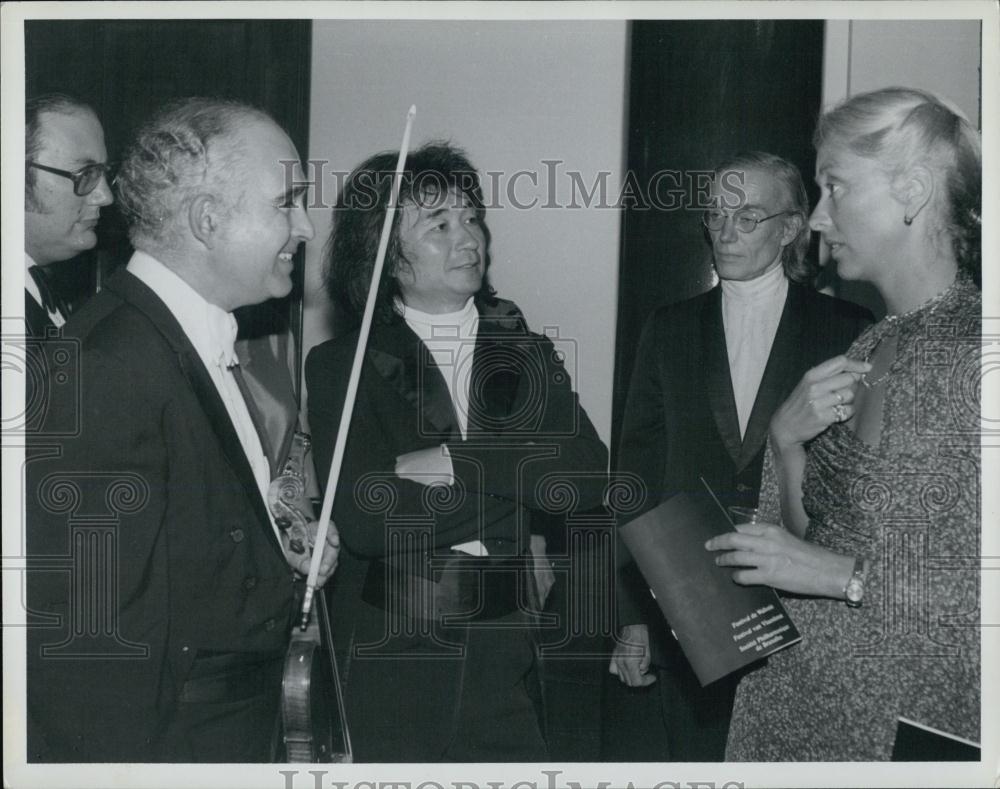 Press Photo Violinists and composer surrounded by group of people - RSL06113 - Historic Images