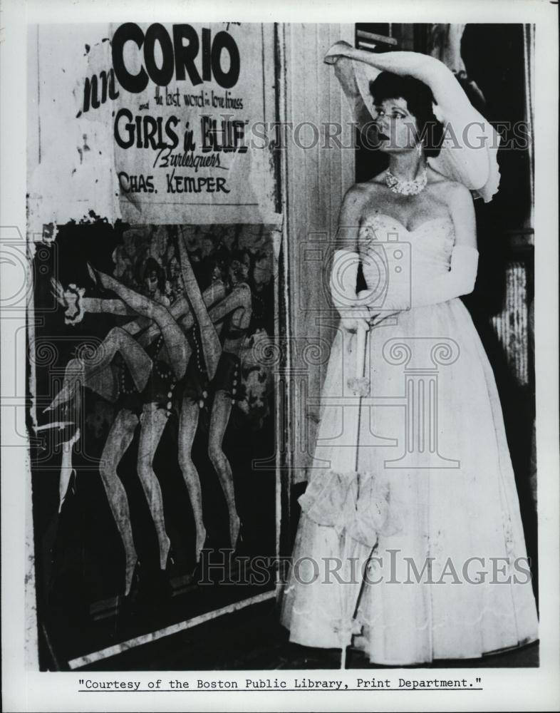 Press Photo Dancer Ann Corio Looks At Poster Advertising &quot;Girls In Blue&quot; - Historic Images