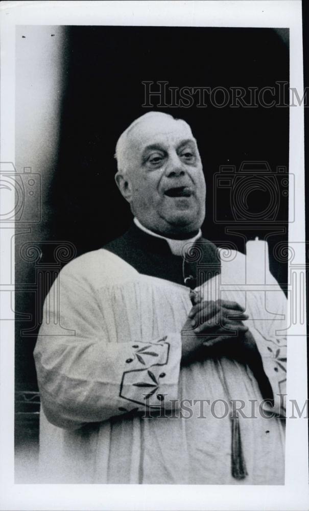 1966 Press Photo Msgr Capoferri Trademark Tongue Protruding From Side Of Mouth - Historic Images