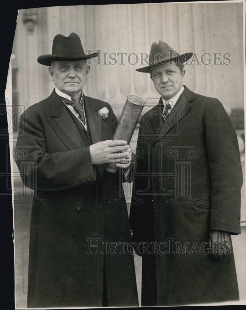Press Photo Congressman CC> Dill and speaker Clark with shell case fired by - Historic Images