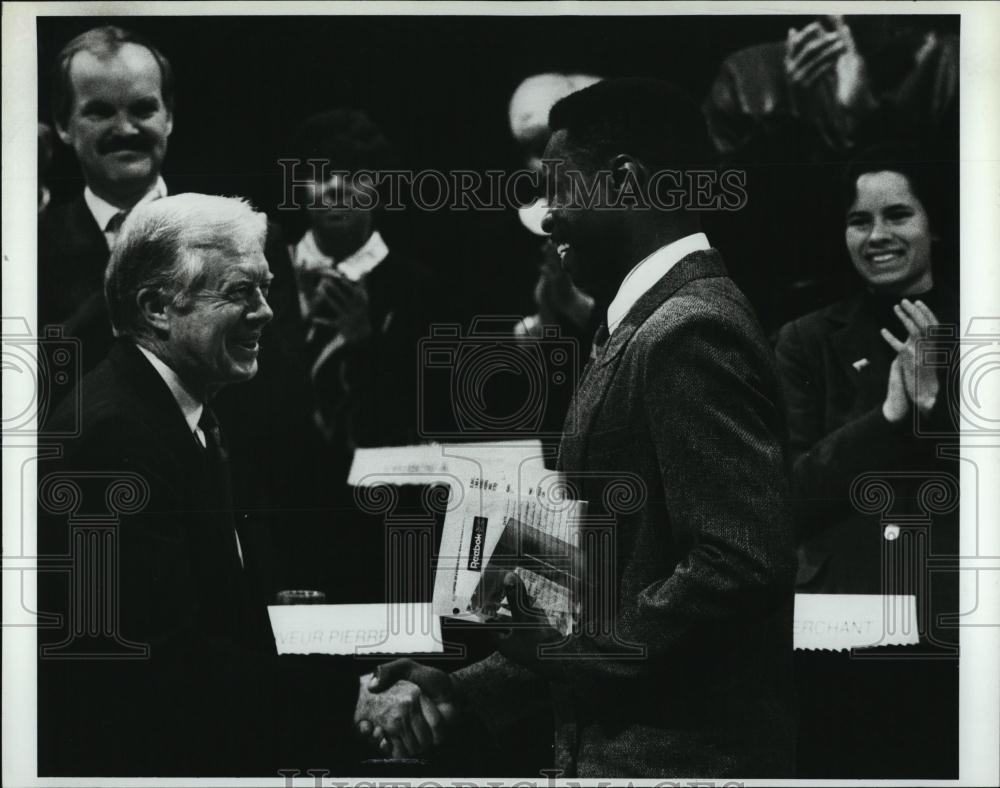 1991 Press Photo Sauveur Pierre Congratulated by Former President Jimmy Carter - Historic Images