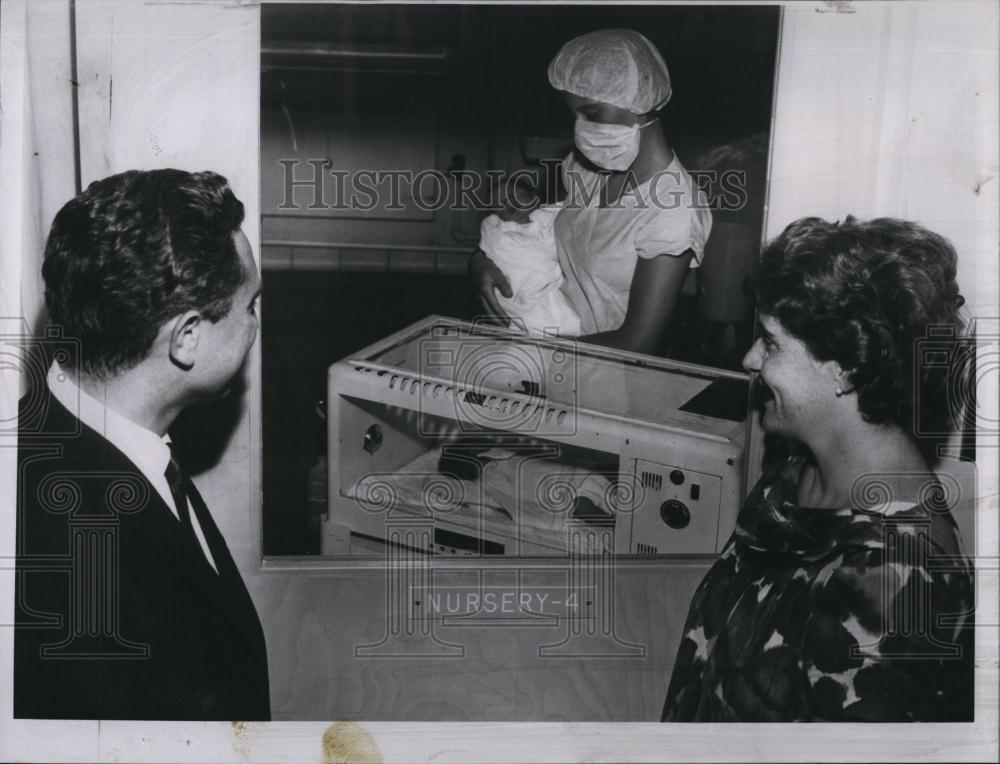 1962 Press Photo Francisco Iglesias looks at new baby boys - RSL86819 - Historic Images