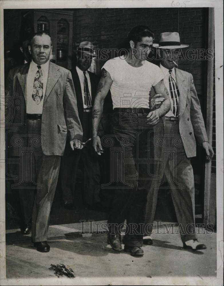 1948 Press Photo Lawrence Marshall in police custody for murder - RSL79661 - Historic Images