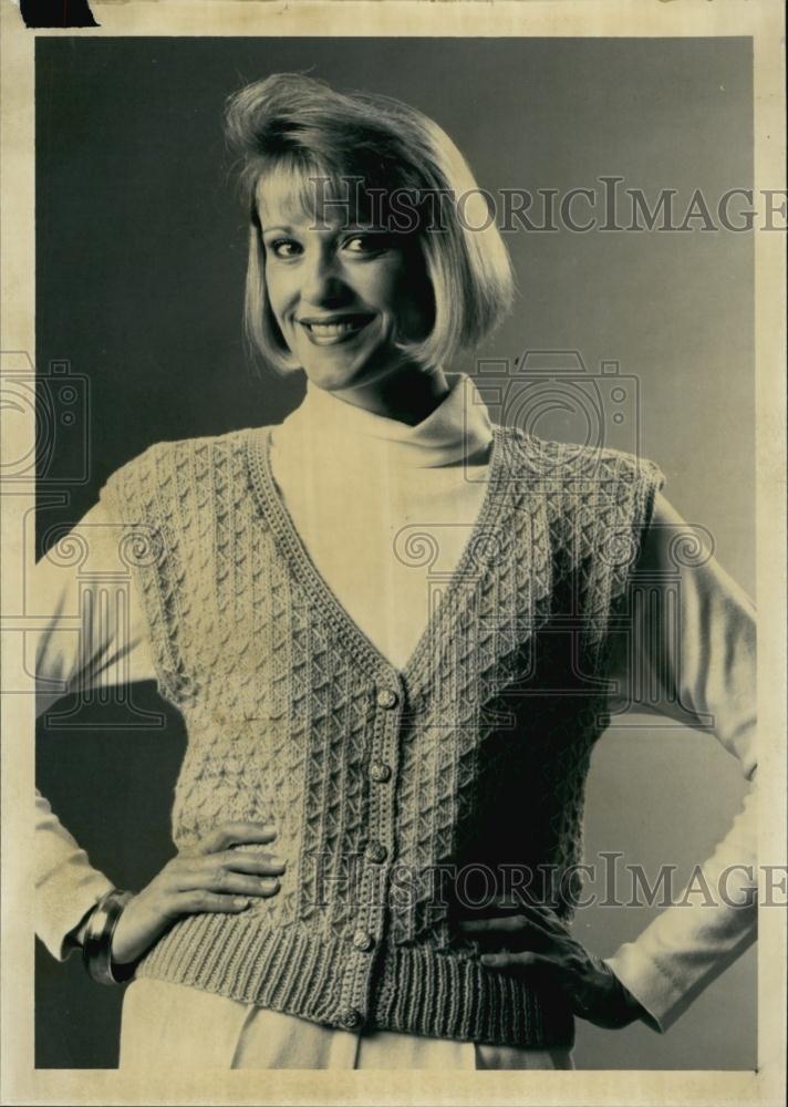 1991 Press Photo A Woman Smiles In A Mock Smock Vest - RSL59541 - Historic Images