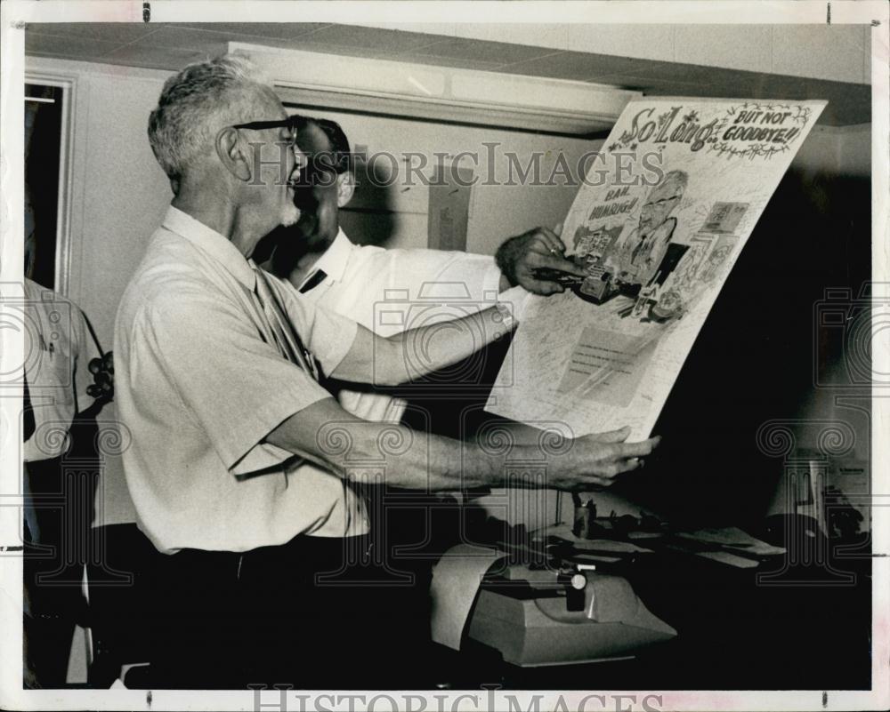 1965 Press Photo Newspaper Men Checking Over Cartoon Signed by Fellow Staffer - Historic Images