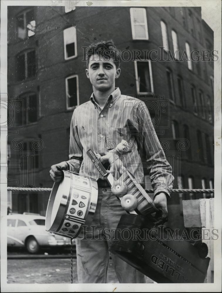 1964 Press Photo Ronald Langlois Carrying Toys After Fire - RSL44583 - Historic Images