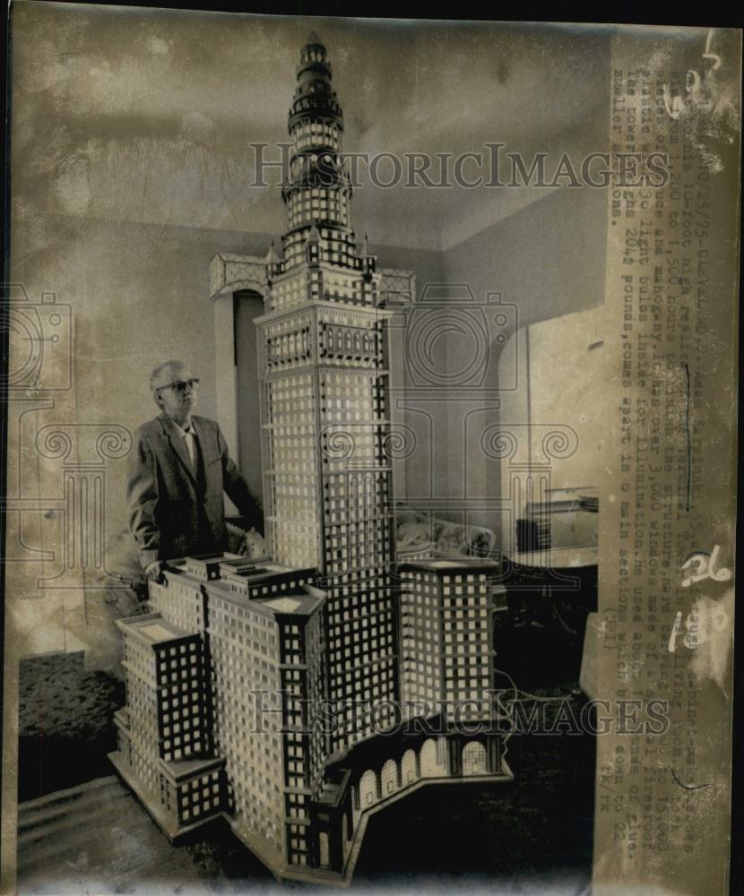 1975 Press Photo Adam Karpinski standing next to replica of Terminal Tower - Historic Images