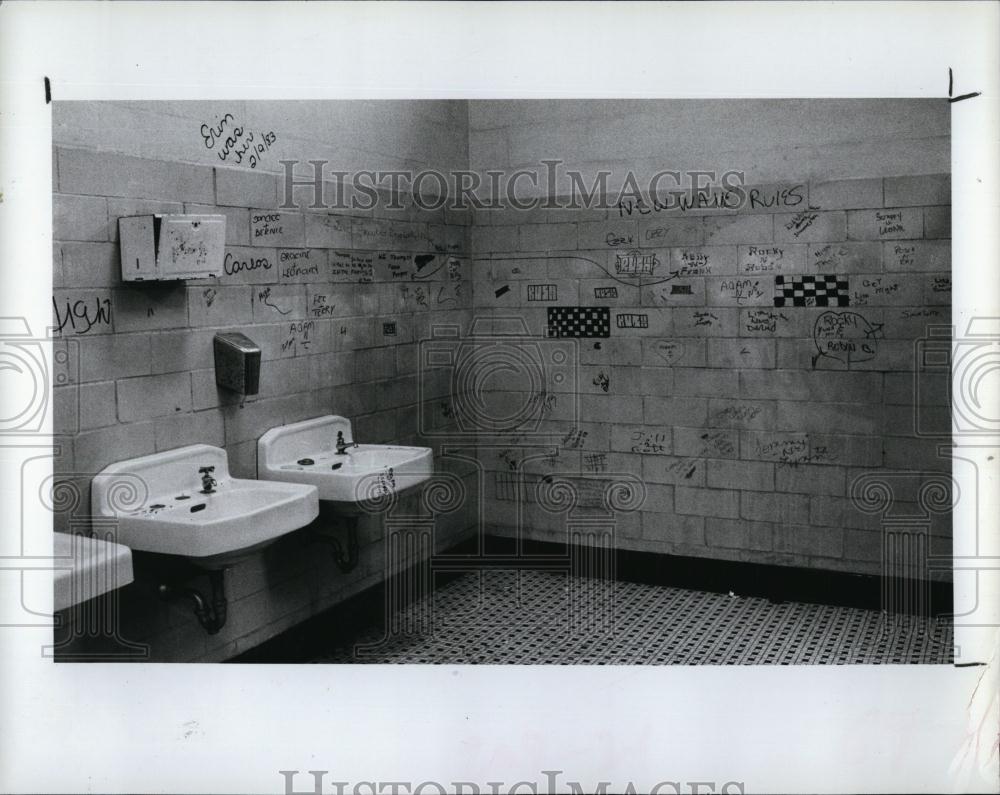 1983 Press Photo Graffiti on Clearwater HS bathroom walls got 3 girls arrested - Historic Images