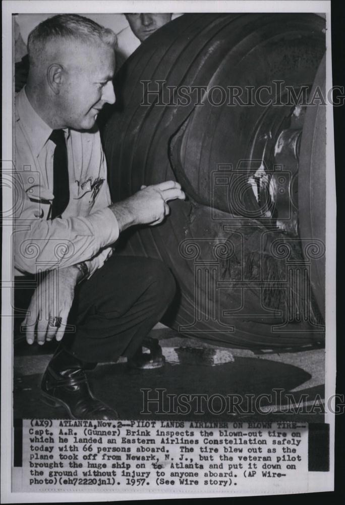 1957 Press Photo AR Gunner Brink, Pilot Lands Plane With Blown Tire - Historic Images