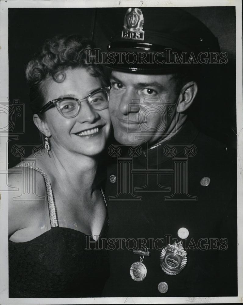 1957 Press Photo Patrolman Caruso Poses With Wife After Receiving Decoration - Historic Images