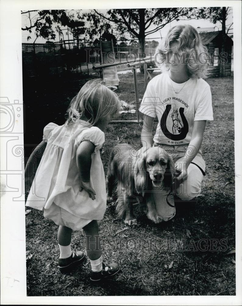 1979 Press Photo Little Kim Burt, Judy Davie, and a cocker spaniel - RSL64835 - Historic Images