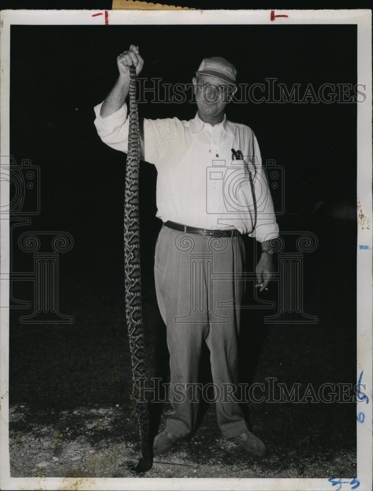 1957 Press Photo Joe S Wills &amp; rattlesnake he caught - RSL93837 - Historic Images