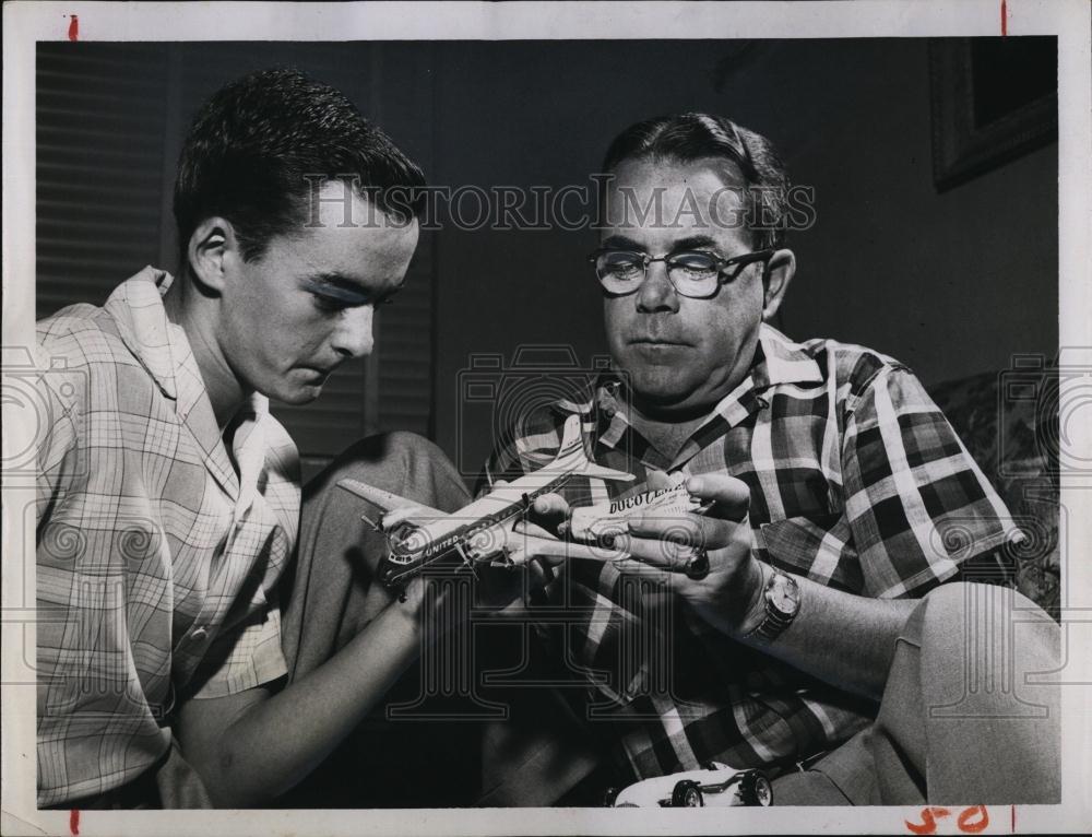 1957 Press Photo Model Plane Enthusiast Paul Tierney Gets Assistance From Dad - Historic Images