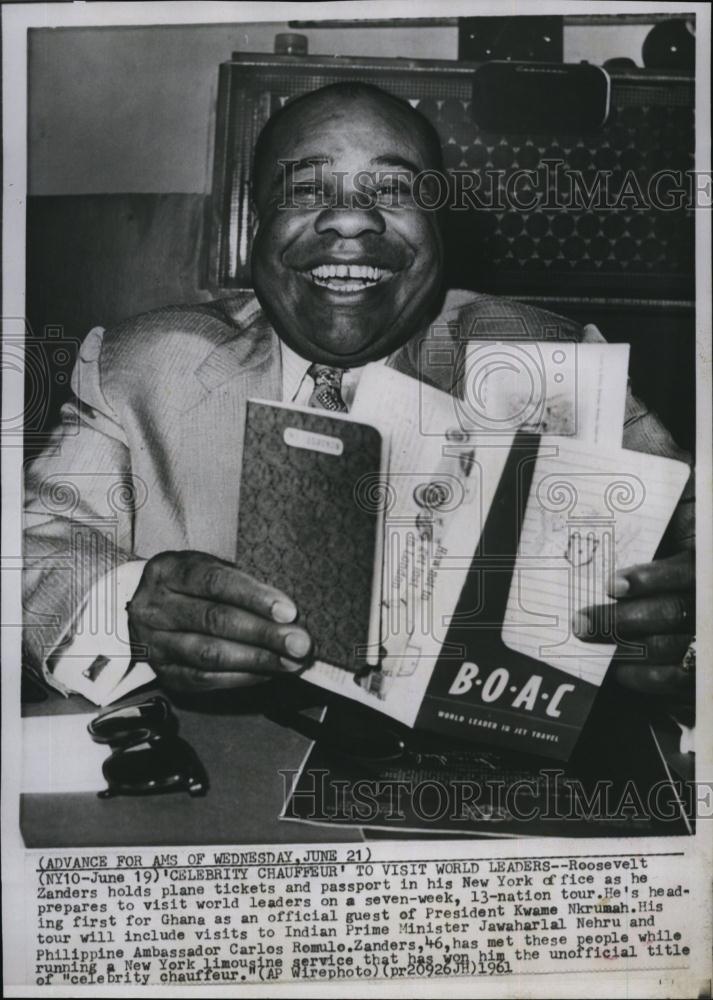 1961 Press Photo Roosevelt Zanders with Plane Tickets &amp; Passport for Mission Tri - Historic Images