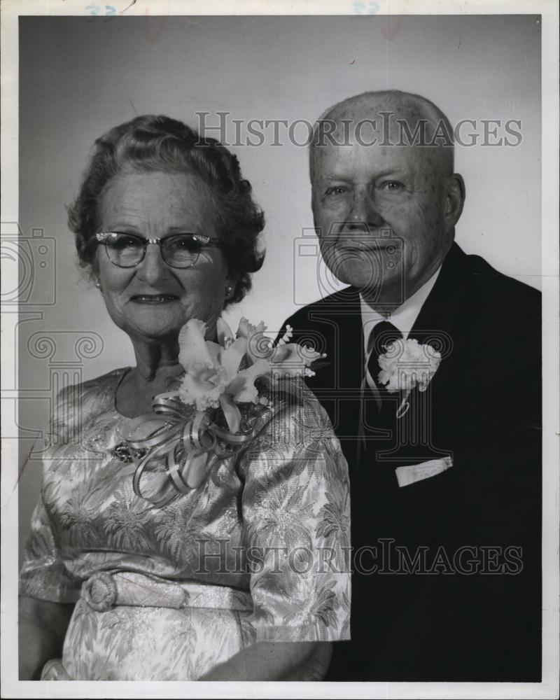 1964 Press Photo Mr and Mrs Louis Paquet in fancy clothes - RSL94377 - Historic Images