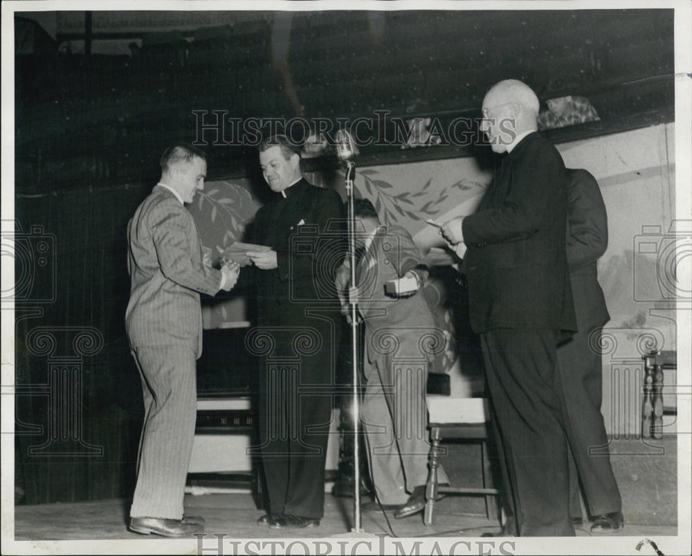 1952 Press Photo Pat Bresnahan gets letter, gold football, Holyoke High - Historic Images