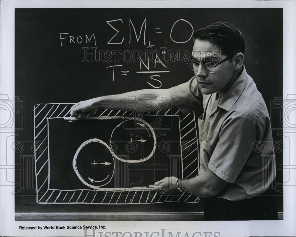 Press Photo Donald Wilkes &amp; research on mini nuclear warhead components - Historic Images