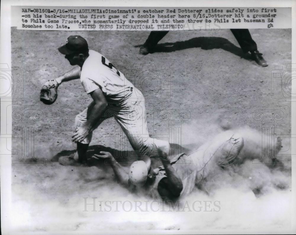 1959 Press Photo Red's Catcher Red Dotterer Slides To First Base - Historic Images