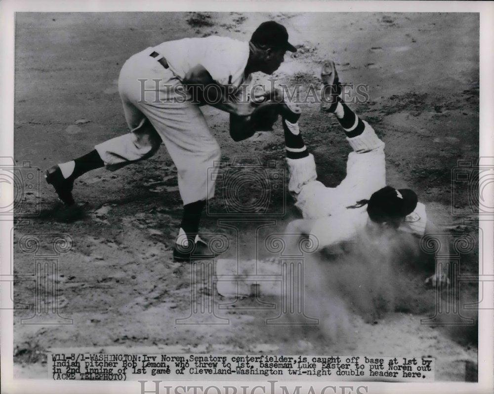 1951 Press Photo Senators Irv Noren caught off base by Indian Pitcher Bob Lemon. - Historic Images