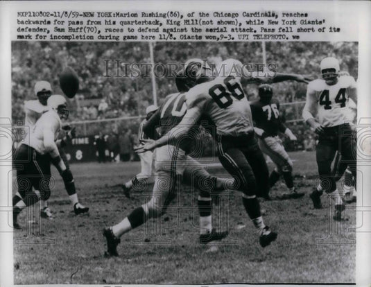 1958 Press Photo Cardinal Marion Ruching vs Giants Sam Huff - nea10922 - Historic Images