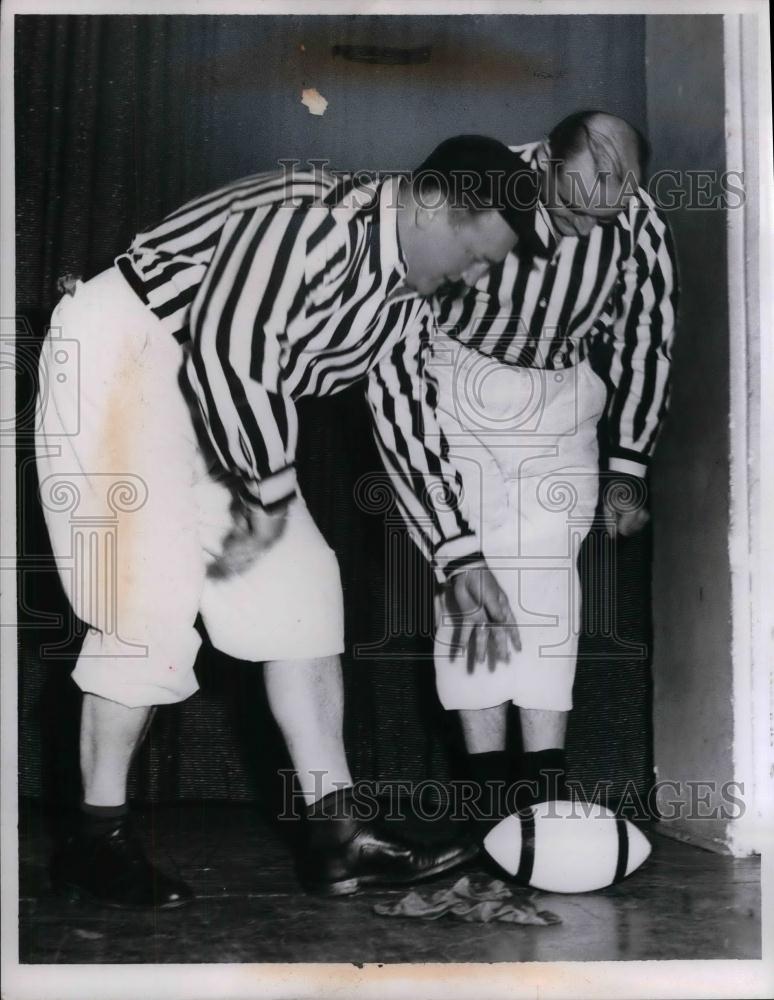 1957 Press Photo Regis McAuley and Ben Wickman picked a football. - nea11373 - Historic Images