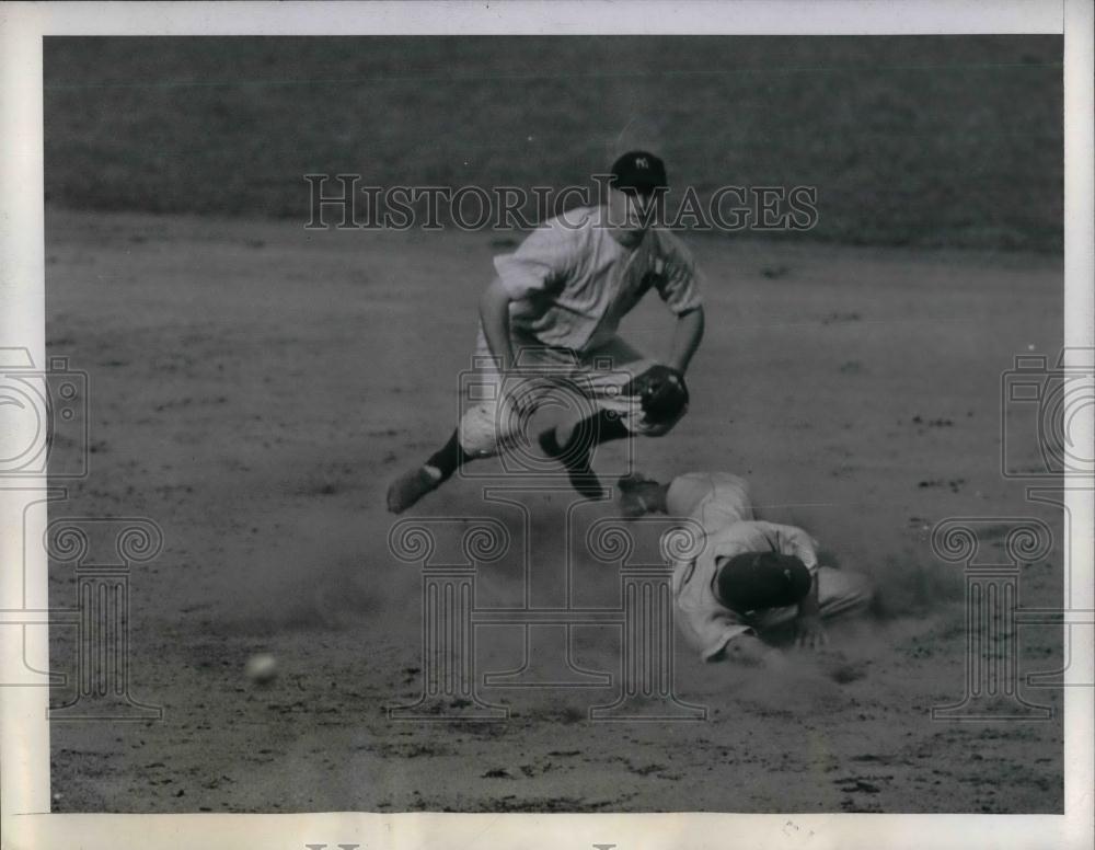 1944 Press Photo Yankee George Stirnweiss vs A's Dick Siebert - nea17600 - Historic Images