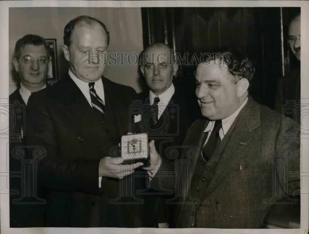 1936 Press Photo NY Mayor LaGuardia presenting alarm clock to Commish Valentine - Historic Images