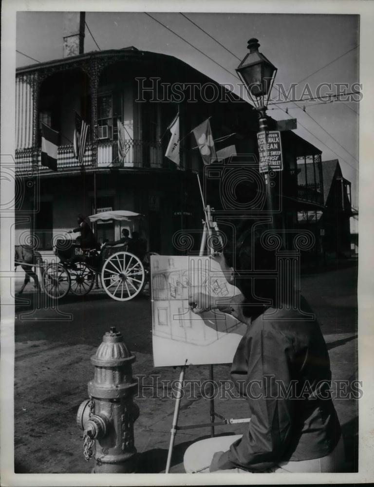 1962 Press Photo Eillen Cipolla Draws on Easel in New Orleans Street - nea19412 - Historic Images